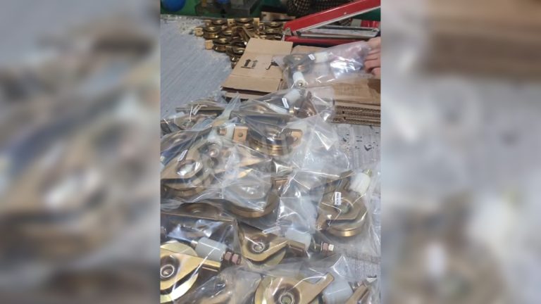  Heavy-duty metal rollers are assembled and packed in the HIPAD workshop. 